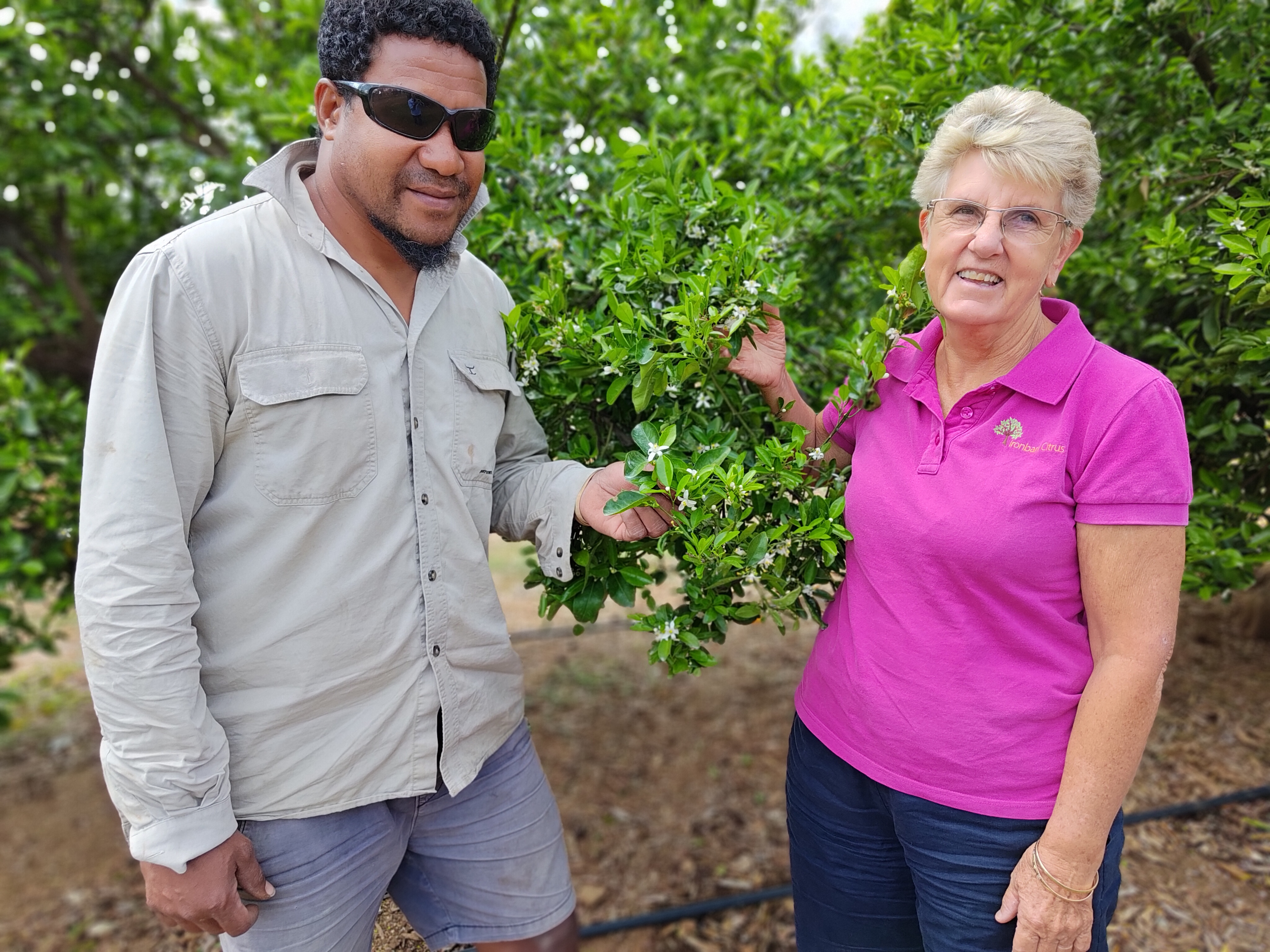 Ironbark Citrus owner Susan Jenkin is pictured with PNG worker, Zac