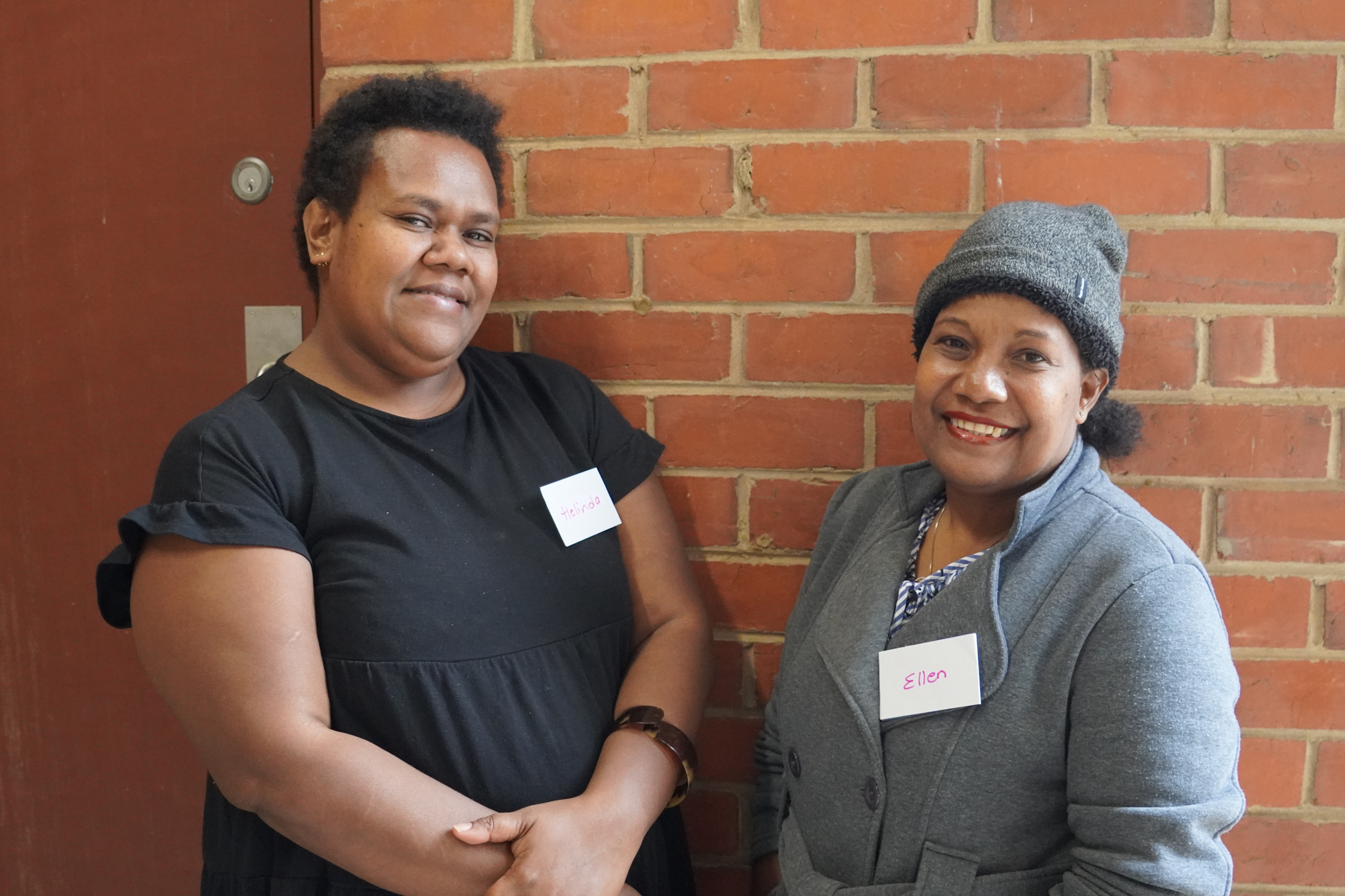 Two women smiling